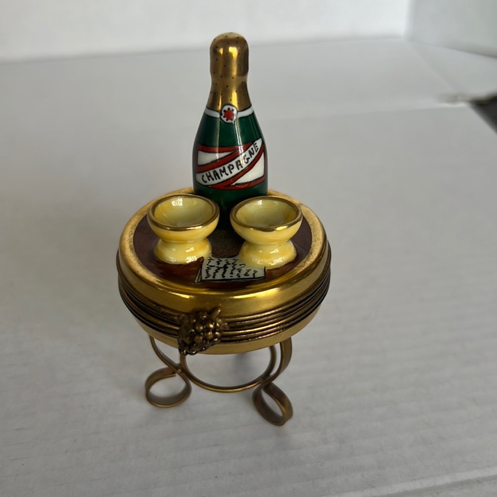 AUTHENTIC LIMOGES TABLE WITH CHAMPAGNE BOTTLE AND GLASSES
